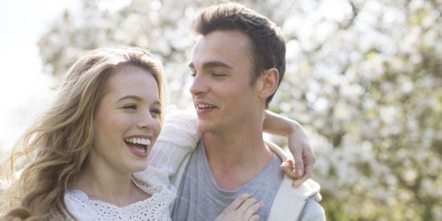 Couple hugging outdoors